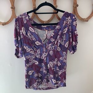 V- neck, button down short sleeve shirt